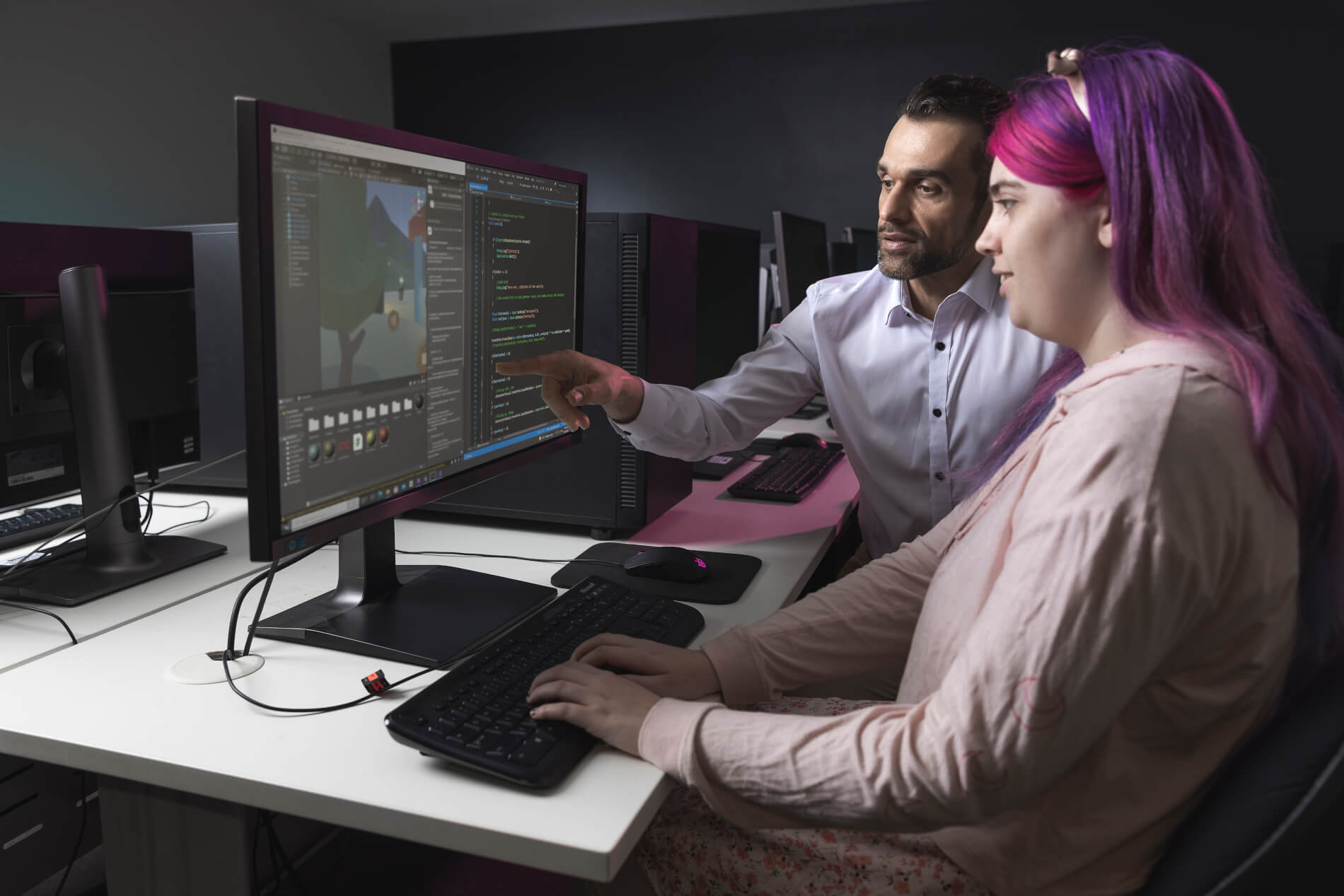 Student and Lecturer with Gaming Computer