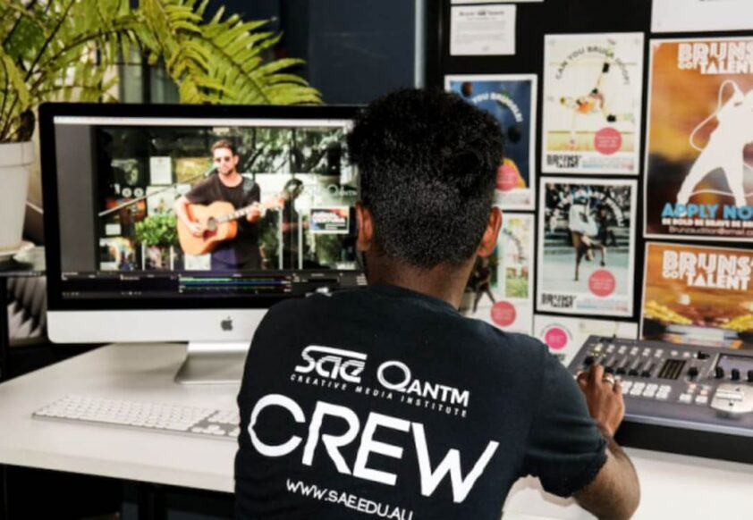 SAE crew member editing Animal ventura footage.